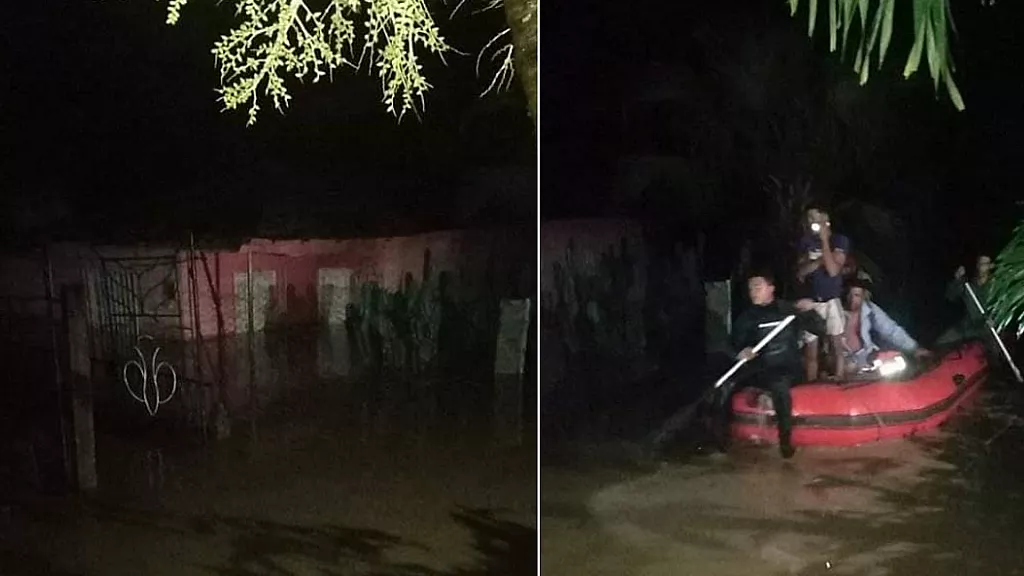 Bomberos cubanos rescatan a personas de las zonas inundadas
