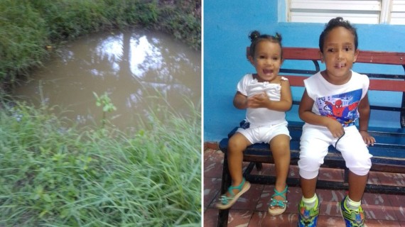 Madre baña a niños con agua de hueco. Foto: Facebook/Leidys Mariam Rodríguez Álvarez Madre baña a niños con agua de hueco. Foto: Facebook/Leidys Mariam Rodríguez Álvarez