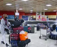 Pasajeros arribando a aeropuertos cubanos