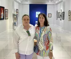Zoé Valdés en expo de Ramón Unzueta en Miami.