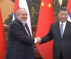 Manuel Marrero y Xi Jinping